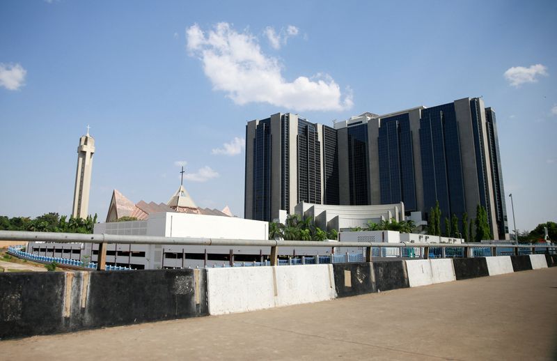 &copy; Reuters. FILE PHOTO: A view of Central Bank of Nigeria headquaters next to National Ecumenical Centre in Abuja, Nigeria November 23, 2021. REUTERS/Afolabi Sotunde/File Photo