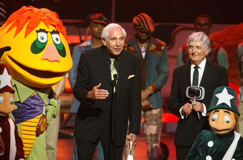 © Reuters. FILE PHOTO: Marty Krofft (C) speaks as he and brother Sid accept a Pop Culture award during their tribute at the taping of the seventh annual TV Land Awards in Los Angeles, California April 19, 2009. REUTERS/Fred Prouser/File Photo