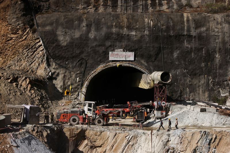 Indian rescuers, two weeks after tunnel collapse, try new tack to reach 41 workers