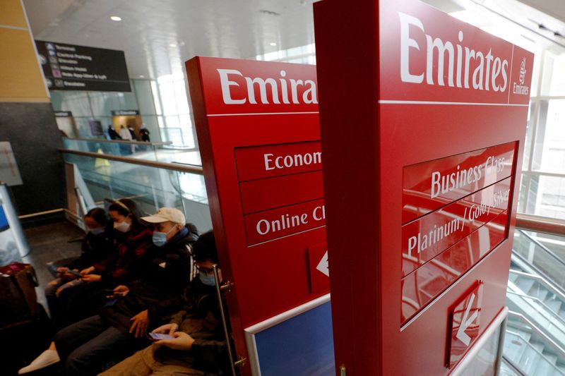 &copy; Reuters. FILE PHOTO: Signs for Emirates airlines are stacked to the side at Logan Airport in Boston, Massachusetts, U.S., January 19, 2022.   REUTERS/Brian Snyder/File Photo