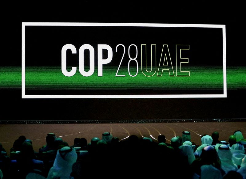 &copy; Reuters. FILE PHOTO: 'COP28 UAE' logo is displayed on the screen during the opening ceremony of Abu Dhabi Sustainability Week (ADSW) under the theme of 'United on Climate Action Toward COP28', in Abu Dhabi, UAE, January 16, 2023. REUTERS/Rula Rouhana/File Photo