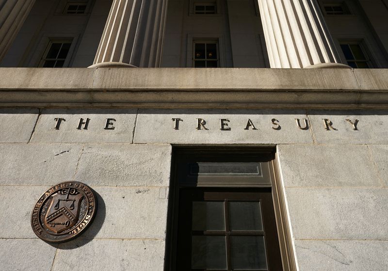 &copy; Reuters. FILE PHOTO: A view shows a bronze seal beside a door at the U.S. Treasury building in Washington, U.S., January 20, 2023.  REUTERS/Kevin Lamarque/File Photo