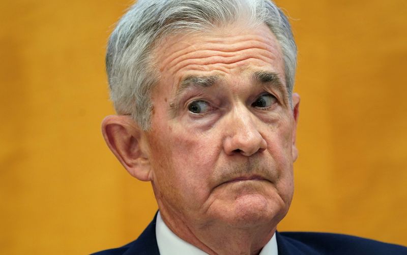 &copy; Reuters. FILE PHOTO: Federal Reserve Chair Jerome Powell reacts to introductory remarks before speaking on "Monetary Policy Challenges in a Global Economy" during the international Monetary Fund's (IMF) annual research conference on "Global Interdependence" in Was