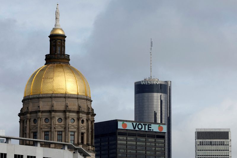 &copy; Reuters. FILE PHOTO: A general view of the Atlanta skyline includes the Georgia Capitol dome and a "Vote" sign atop the 100 Peachtree building, days ahead of nationally significant U.S. Senate and state governor elections in Atlanta, Georgia, U.S. November 6, 2022