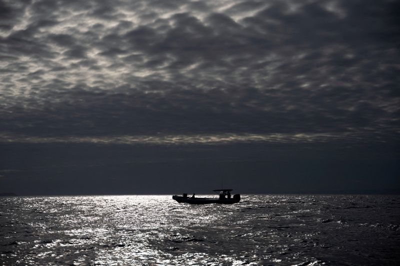 &copy; Reuters. FILE PHOTO: Fishermen go out to sea after Ecuador's goverment expanded the protected marine area around the Galapagos Islands, Ecuador January 24, 2022. REUTERS/Santiago Arcos
