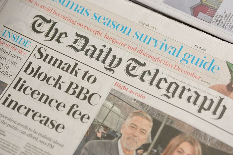 © Reuters. The Daily Telegraph newspaper is seen on a shop counter at the newsagents in London, Britain December 4, 2023. REUTERS/Maja Smiejkowska