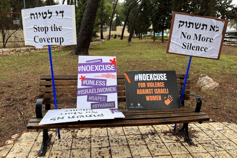 &copy; Reuters. Signs against what protesters describe as international silence over sexual violence perpetrated against Israeli women during the attack by Palestinian Islamist group Hamas on southern Israel on October 7, are displayed on a bench at a protest in Jerusale