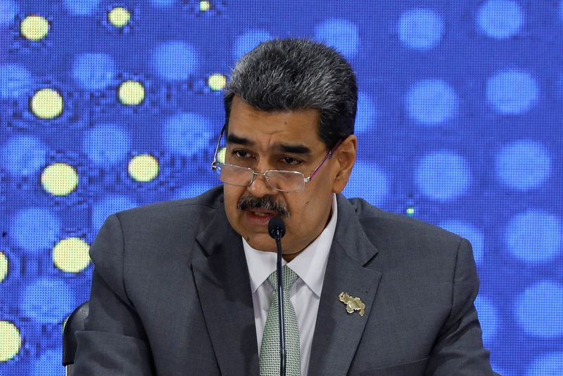 &copy; Reuters. Venezuelan President Nicolas Maduro attends an event at the National Electoral Council (CNE) after voters in a referendum rejected the International Court of Justice's (ICJ) jurisdiction over the country's territorial dispute with Guyana and backed the cr