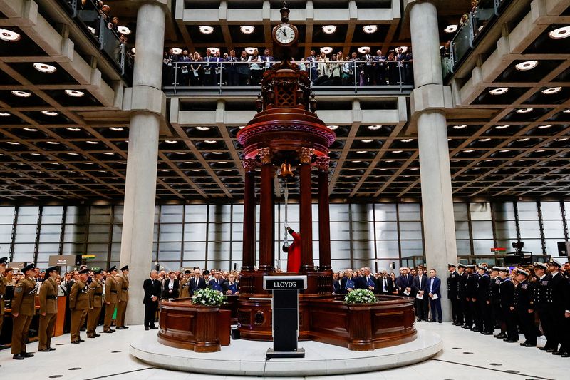 &copy; Reuters. FILE PHOTO: A Lloyd's waiter rings the Lutine Bell during an event to mark accession of Britain's King Charles at the Lloyd's Building in the City of London, Britain, September 15, 2022. REUTERS/Sarah Meyssonnier/File Photo