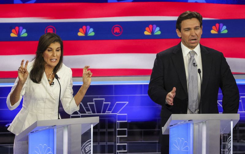 &copy; Reuters. Former South Carolina Governor Nikki Haley and Florida Governor Ron DeSantis speak simultaneously at the third Republican candidates' U.S. presidential debate of the 2024 U.S. presidential campaign hosted by NBC News at the Adrienne Arsht Center for the P