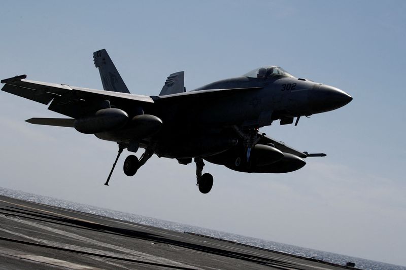 &copy; Reuters. A U.S. navy F-18 Super Hornet lands on the flight deck on the USS Nimitz, off the coast of Busan, South Korea, 27 March, 2023. The ROK-US combined maritime exercise is a part of Warrior Shield. Jeon Heon-Kyun/Pool via REUTERS/File Photo