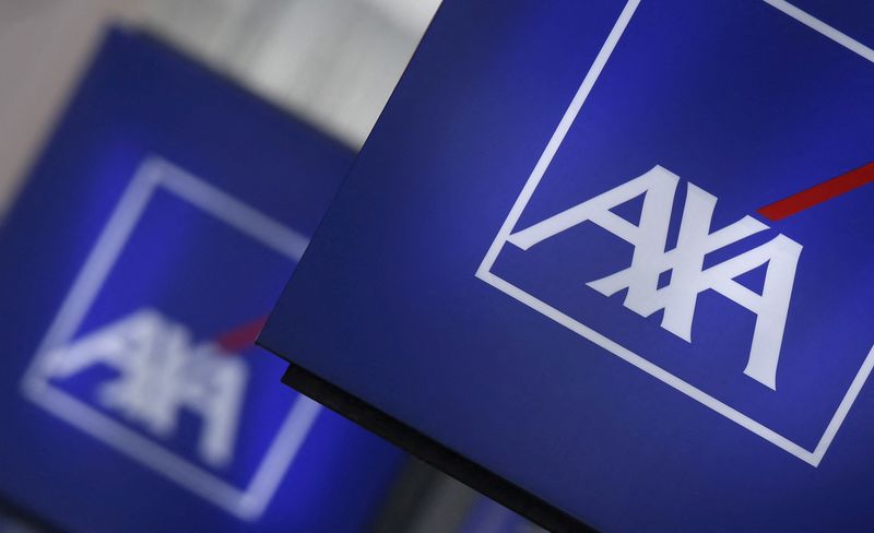 &copy; Reuters. FILE PHOTO: Signs displaying the logo of French insurer AXA on a building in Nanterre, near Paris, March 8, 2016. REUTERS/Christian Hartmann/File Photo