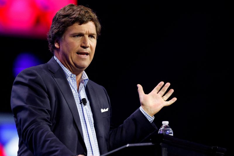 &copy; Reuters. FILE PHOTO: Former Fox News commentator Tucker Carlson speaks during the Turning Point Action Conference in West Palm Beach, Florida, U.S. July 15, 2023.  REUTERS/Marco Bello/File Photo