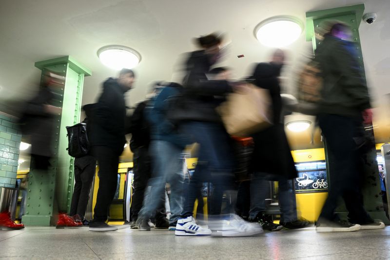 &copy; Reuters. Commuters walk on a Berlin transport company BVG subway platform at Alexanderplatz station during a nationwide strike called by the German trade union Verdi over a wage dispute, in Berlin, Germany, March 27, 2023. REUTERS/Annegret Hilse/File Photo