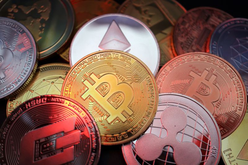 &copy; Reuters. Representations of cryptocurrencies including Bitcoin, Dash, Ethereum, Ripple and Litecoin are seen in this illustration picture taken June 2, 2021. REUTERS/Florence Lo/Illustration/File Photo