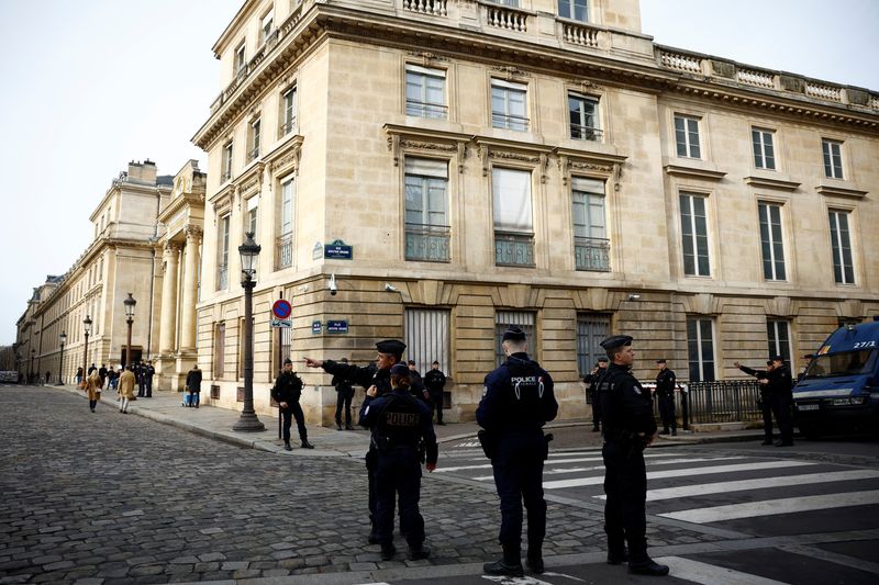 &copy; Reuters. French police stand in position near the National Assembly as protesters gather before the start of a debate on the immigration law in Paris, France, December 11, 2023. REUTERS/Sarah Meyssonnier