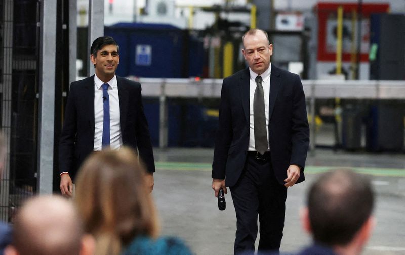 &copy; Reuters. Prime Minister Rishi Sunak (left) and Northern Ireland Secretary Chris Heaton-Harris hold a Q&A session with local business leaders during a visit to Coca-Cola HBC in Lisburn, Co Antrim in Northern Ireland. Picture date: Tuesday February 28, 2023. Liam Mc