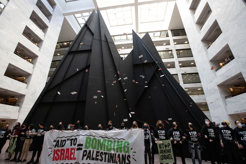 &copy; Reuters. Activists engage in civil disobedience alongside Calder's Mountains and Clouds sculpture in the Hart Senate Office Building atrium, part of the U.S. Capitol complex, to call for a permanent ceasefire in Gaza and redirection of military aid for Israel, in 