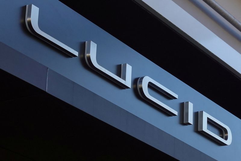 &copy; Reuters. FILE PHOTO: The LUCID electric car logo os shown above one of the company retail stores in a shopping mall in San Diego, California, U.S.,October 20, 2023.     REUTERS/Mike Blake/File Photo
