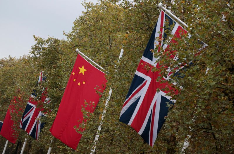 &copy; Reuters. FILE PHOTO: Chinese and British flags fly along the Mall in London, Britain October 19, 2015. REUTERS/Suzanne Plunkett/File Photo