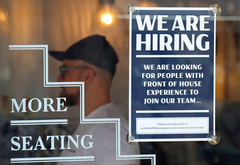 &copy; Reuters. FILE PHOTO: A restaurant advertises for workers in Brighton, Britain, Aug. 15, 2023. REUTERS/Toby Melville/File Photo