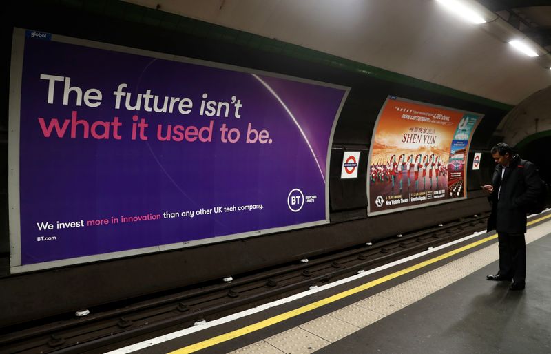 © Reuters. British Telecom (BT) advertisement is displayed at Goodge Street underground station in London, Britain, November 15, 2019. REUTERS/Simon Dawson/File Photo