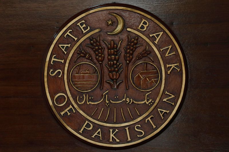 &copy; Reuters. FILE PHOTO: A logo of the State Bank of Pakistan (SBP) is pictured on a reception desk at the head office in Karachi, Pakistan July 16, 2019. REUTERS/Akhtar Soomro/File Photo