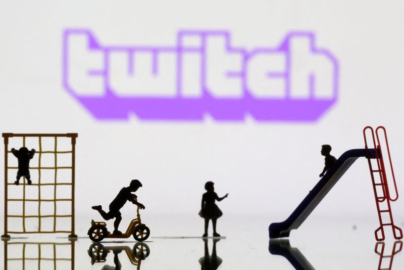 &copy; Reuters. FILE PHOTO: Children playground miniatures are seen in front of displayed Twitch logo in this illustration taken April 4, 2023. REUTERS/Dado Ruvic/Illustration/File Photo