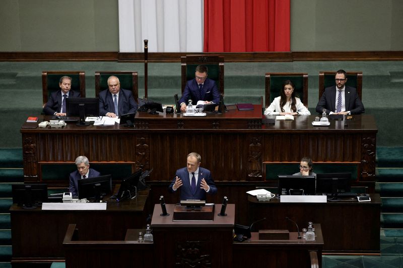 &copy; Reuters. Newly appointed Polish Prime Minister Donald Tusk presents his government's programme and asks for a vote of confidence in Parliament in Warsaw, Poland December 12, 2023. Dawid Zuchowicz/Agencja Wyborcza.pl via REUTERS 