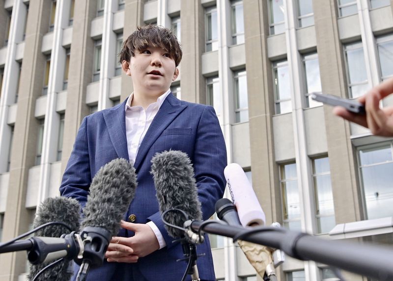 &copy; Reuters. Rina Gonoi, a former member of Japan Self-Defense Forces, who has accused colleagues of sexually assaulting her during her time in the military, speaks to the media at the Fukushima District Court in Fukushima, Japan December 12, 2023, in this photo taken