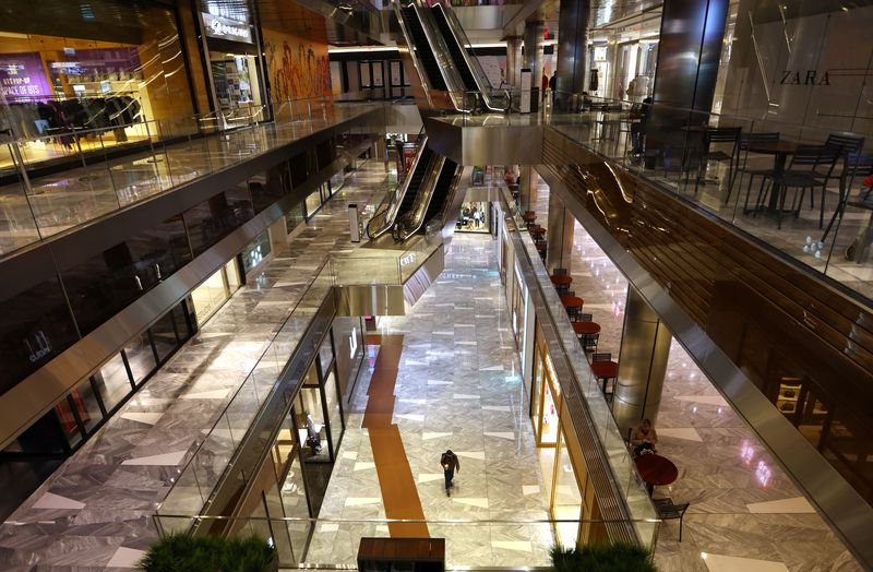 &copy; Reuters. FILE PHOTO: A person walks through a nearly empty area of retail shops inside The Shops & Restaurants at Hudson Yards in Manhattan in New York City, New York, U.S., April 17, 2023. REUTERS/Mike Segar/File Photo