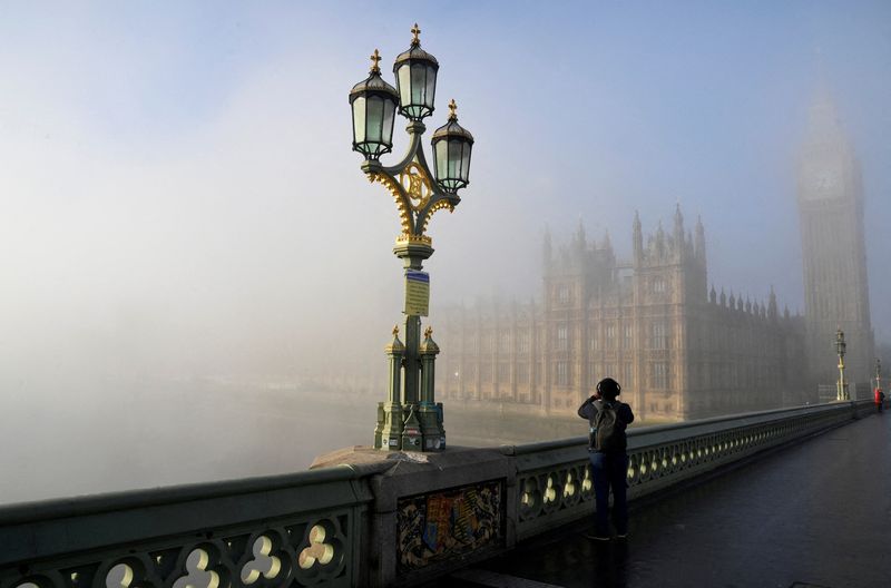 &copy; Reuters. FILE PHOTO: Fog shrouds the Houses of Parliament in London, Britain, February 7, 2023. REUTERS/Toby Melville/File Photo