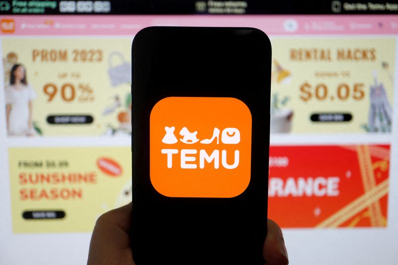 &copy; Reuters. FILE PHOTO: The logo of Temu, an e-commerce platform owned by PDD Holdings, is seen on a mobile phone displayed in front of its website, in this illustration picture taken April 26, 2023. REUTERS/Florence Lo/Illustration/File Photo