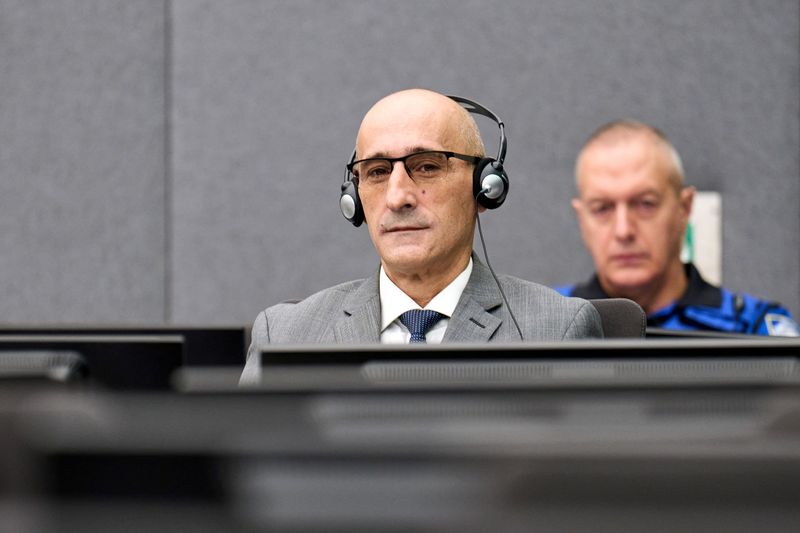 &copy; Reuters. Salih Mustafa at the start of the pronouncement of the appeal judgment in the case of the Specialist Prosecutor v. Salih Mustafa at the Kosovo Specialist Chambers court in The Hague, Netherlands, 14 December 2023. Phil Nijhuis/Pool via REUTERS