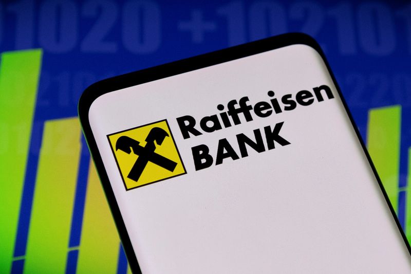 &copy; Reuters. Raiffeisen logo and stock graph are seen displayed in this illustration taken, May 3, 2022. REUTERS/Dado Ruvic/Illustration/File Photo