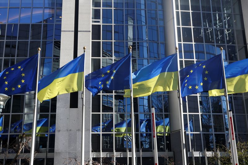 &copy; Reuters. Flags of European Union and Ukraine flutter outside EU Parliament building, in Brussels, Belgium, February 28, 2022.  REUTERS/Yves Herman/ File Photo