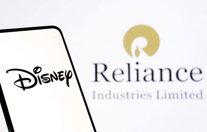 © Reuters. Disney and Reliance logos are seen in this illustration taken December 15, 2023. REUTERS/Dado Ruvic/Illustration