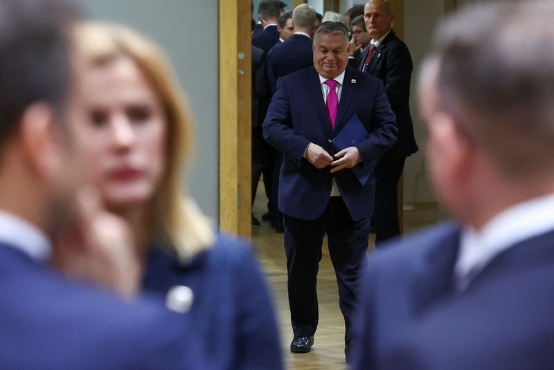 © Reuters. Hungary's Prime Minister Viktor Orban walks as he attends a European Union leaders summit, in Brussels, Belgium December 14, 2023. REUTERS/Yves Herman