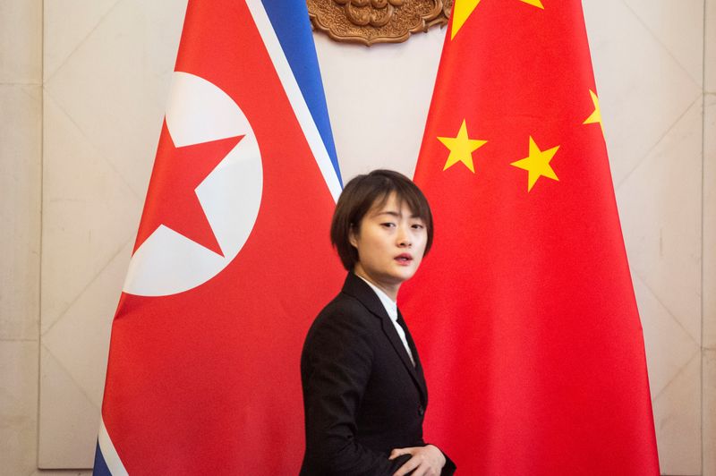 &copy; Reuters. Photo des drapeaux nord-coréens et chinois. /Photo prise le 7 décembre 2018 à Pékin/REUTERS/Fred Dufour