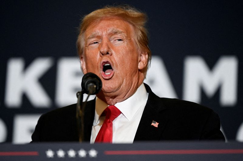 &copy; Reuters. FILE PHOTO: Former U.S. President and Republican presidential candidate Donald Trump speaks during a "Commit to Caucus" event for his supporters in Coralville, Iowa, U.S., December 13, 2023.  REUTERS/Vincent Alban/File Photo