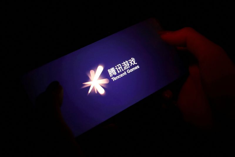 &copy; Reuters. FILE PHOTO: The Tencent Games logo is seen on its game on a mobile phone in this illustration picture taken Aug. 3, 2021. REUTERS/Florence Lo/Illustration/File Photo