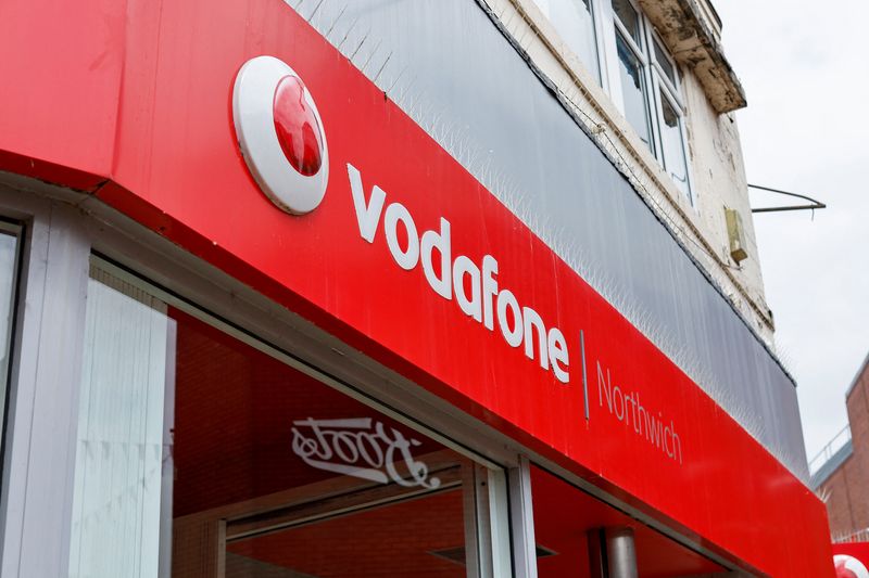 &copy; Reuters. The logo of Vodafone is seen at a Vodafone store in Northwich, Cheshire, Britain, June 7, 2023. REUTERS/Jason Cairnduff/file photo