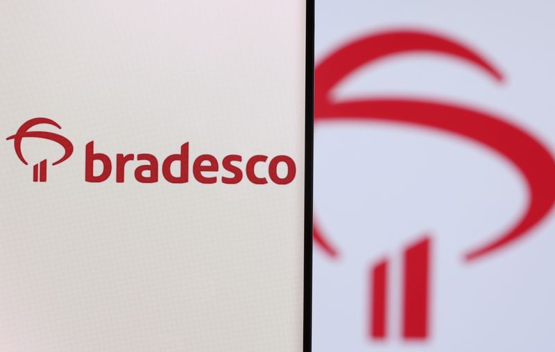 &copy; Reuters. FILE PHOTO: Banco Bradesco logo is seen on a smartphone in front of displayed same logo in this illustration taken, December 1, 2021. REUTERS/Dado Ruvic/Illustration/File Photo