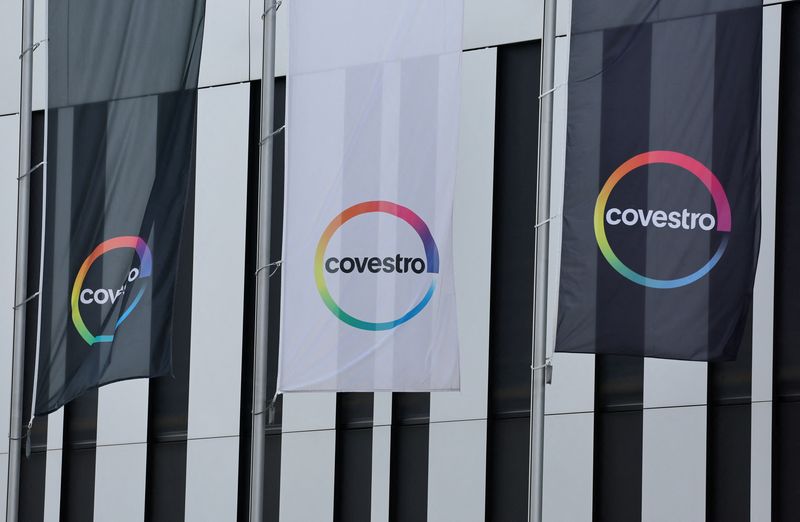 &copy; Reuters. FILE PHOTO: Flags with the logo of German chemicals maker Covestro flutter in the wind near its headquarters in the so-called industrial park "Chempark" of the chemical industry in Leverkusen, Germany, September 28, 2023. REUTERS/Wolfgang Rattay/File Phot