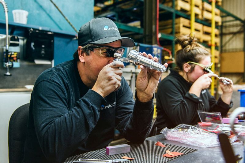 © Reuters. Employees work at a Meloche Group production facility in Quebec, Canada, in this 2021 handout photo. Meloche Group/Handout via REUTERS