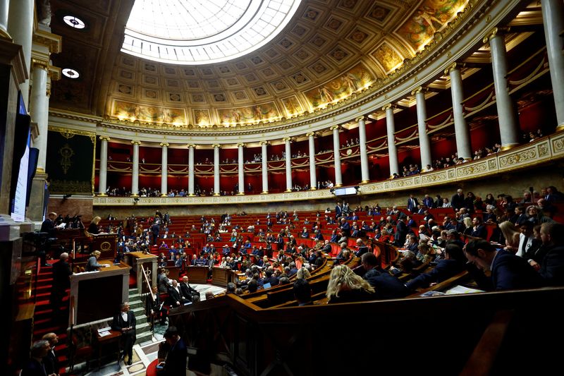 &copy; Reuters. 　１２月１９日、フランス議会は不法移民の規制強化法案を可決した。写真は１９日、パリで撮影（２０２３年　ロイター/Sarah Meyssonnier）