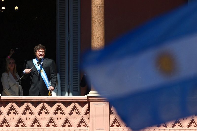 &copy; Reuters. Argentina's President Javier Milei addresses supporters gathered outside Casa Rosada after his swearing-in ceremony, in Buenos Aires, Argentina December 10, 2023. REUTERS/Matias Baglietto/File Photo