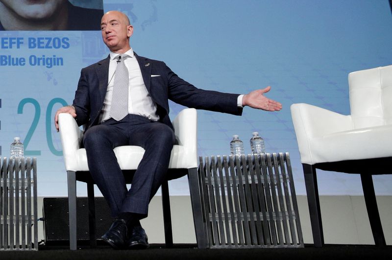 &copy; Reuters. FILE PHOTO: Jeff Bezos, founder of Blue Origin and CEO of Amazon, speaks about the future plans of Blue Origin during an address to attendees at Access Intelligence's SATELLITE 2017 conference in Washington, U.S., March 7, 2017. REUTERS/Joshua Roberts/Fil