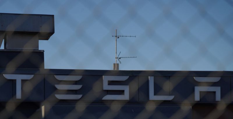 &copy; Reuters. FILE PHOTO: A Tesla sign is displayed over a Tesla showroom in Malmo, Sweden, December 14, 2023. REUTERS/ Tom Little/File Photo