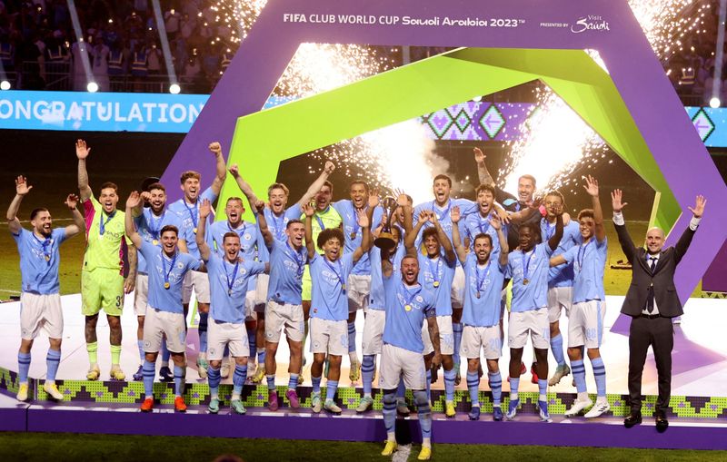 &copy; Reuters. Jogadores do Manchester City comemoram conquista do Mundial de Clubes
22/12/2023
REUTERS/Ahmed Yosri